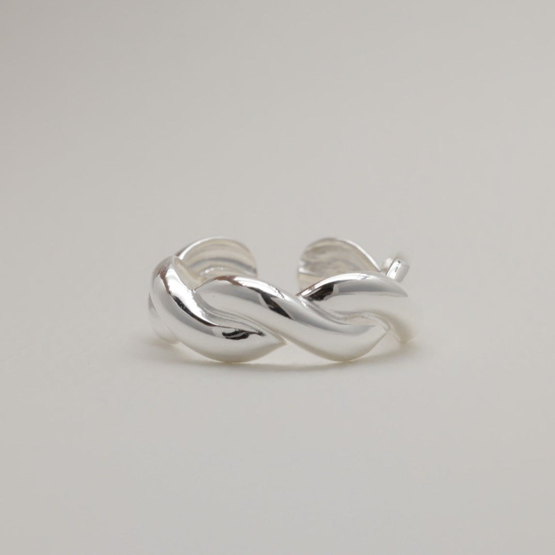 Sterling silver braided ring with open adjustable back