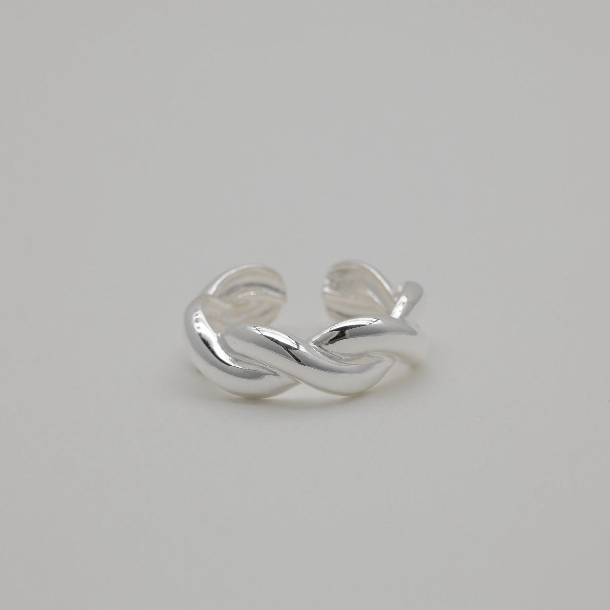 Polished 925 silver ring with sculptural twist design