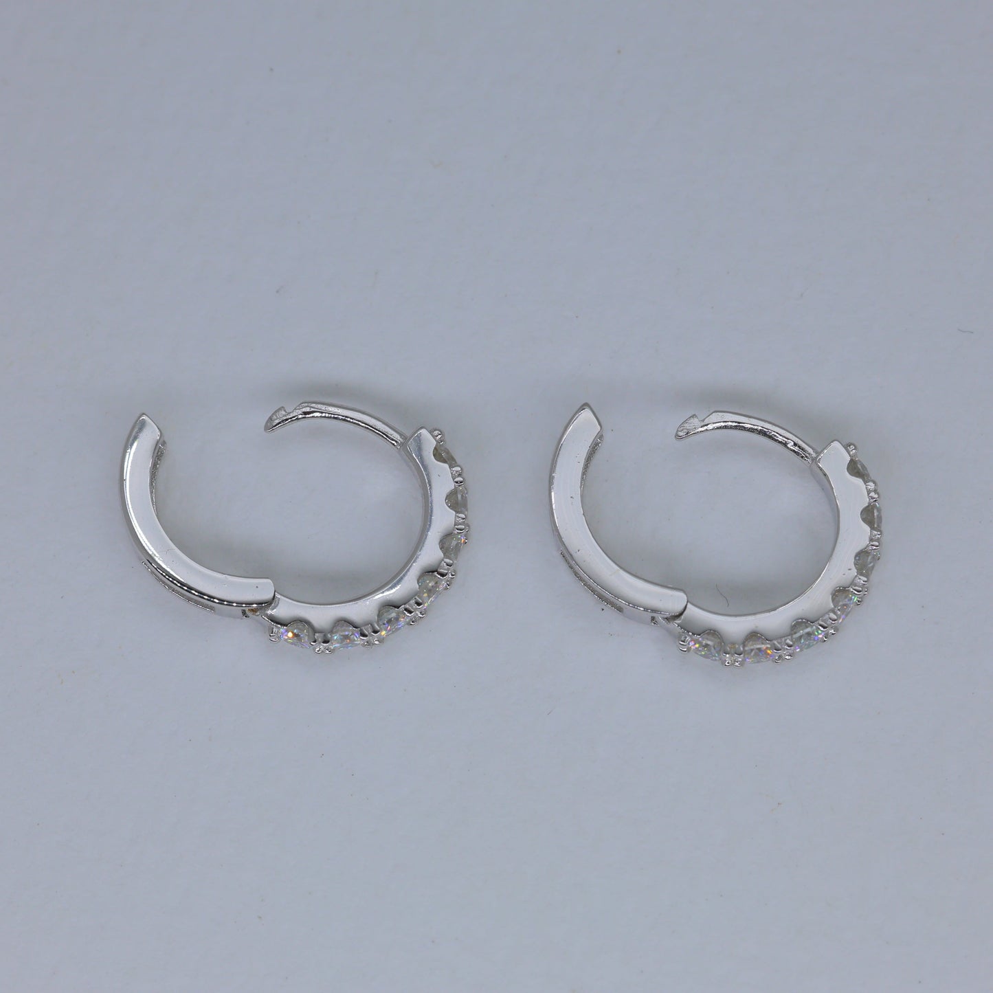 Sevara Pave Huggie Earrings in 925 Sterling Silver by MOA - view 2