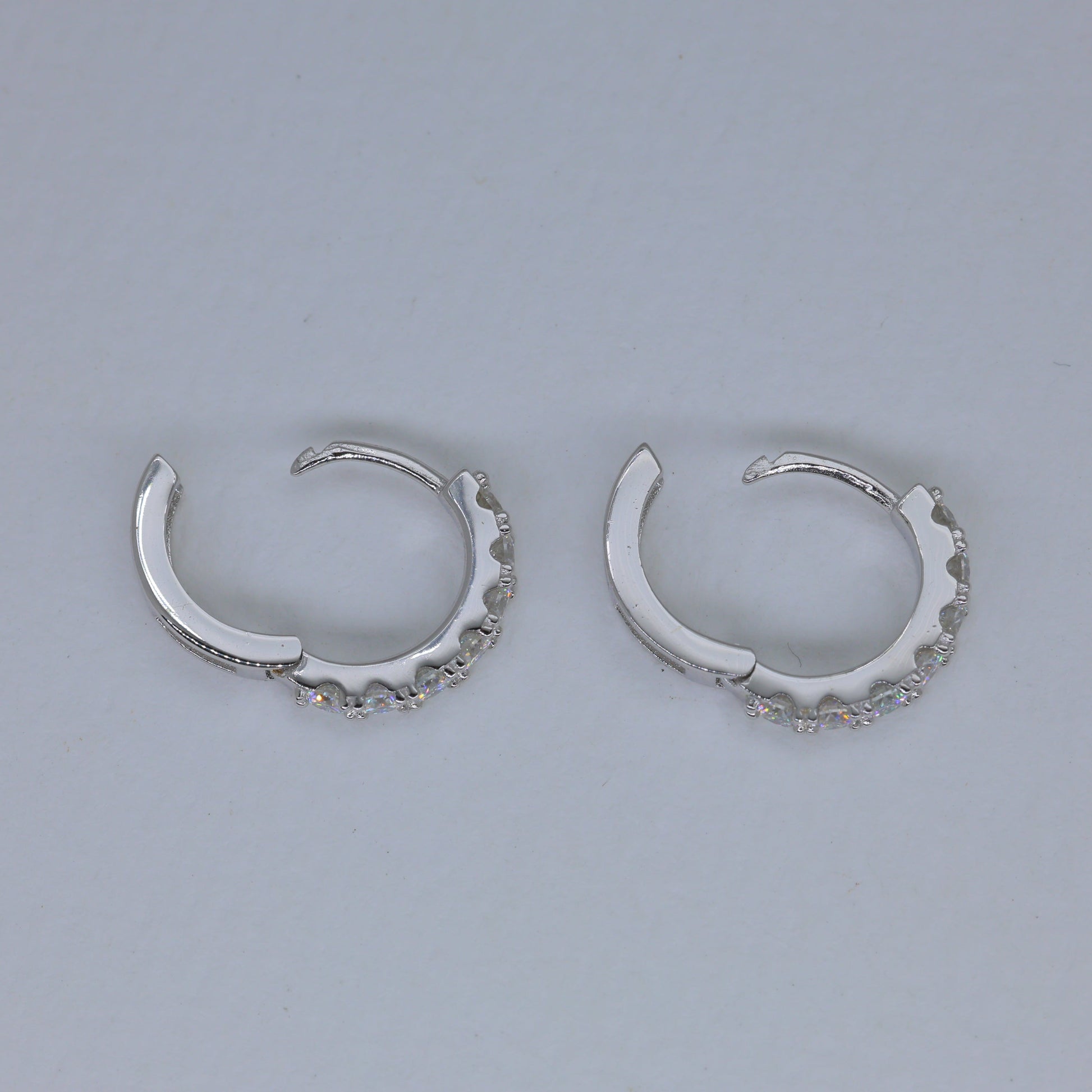 Sevara Pave Huggie Earrings in 925 Sterling Silver by MOA - view 2