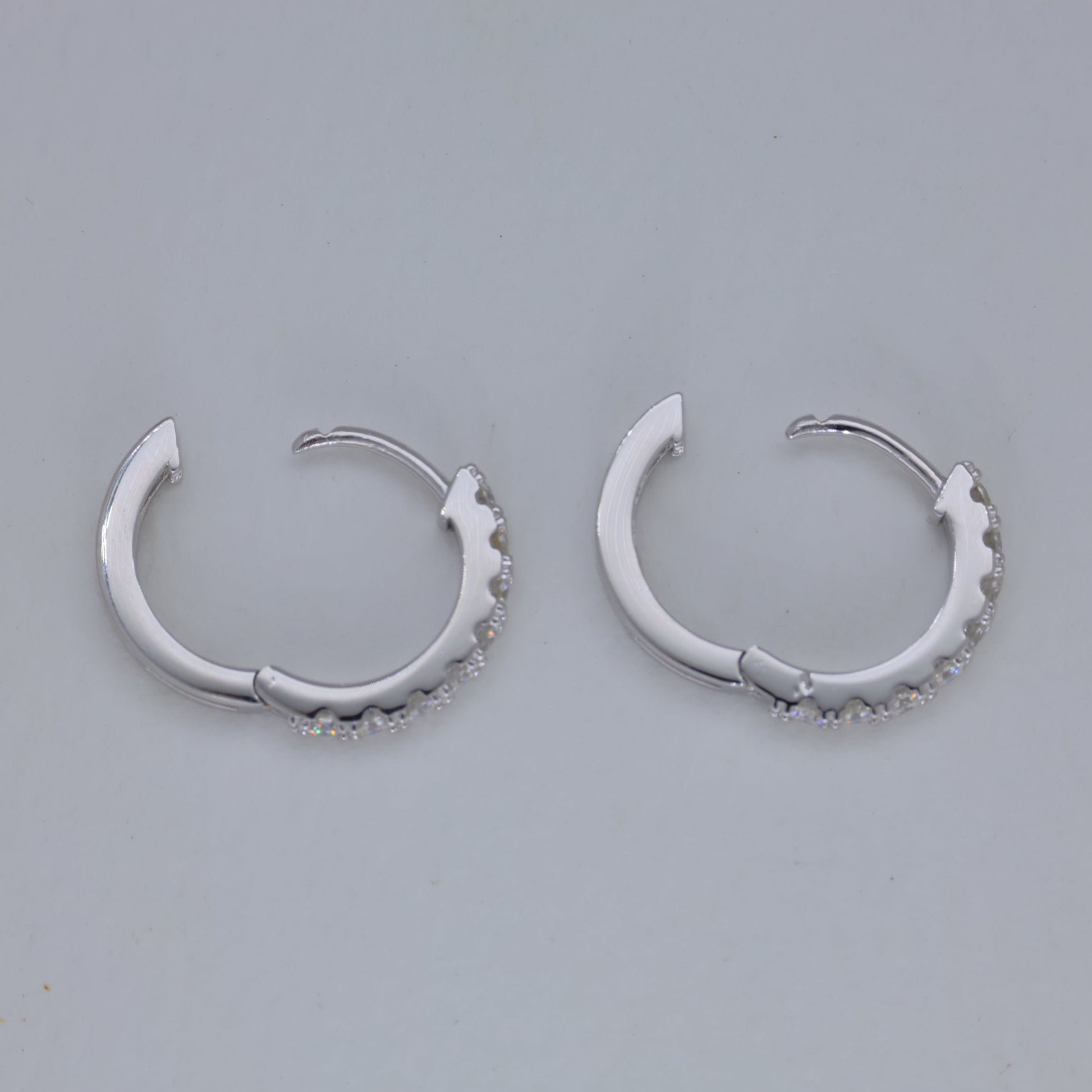 Sevara Pave Huggie Earrings in 925 Sterling Silver by MOA - view 4