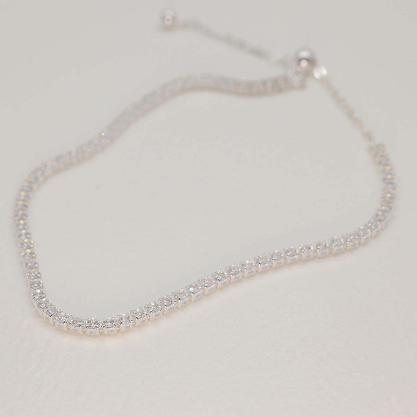 Bracelet laid flat with extender and clasp visible