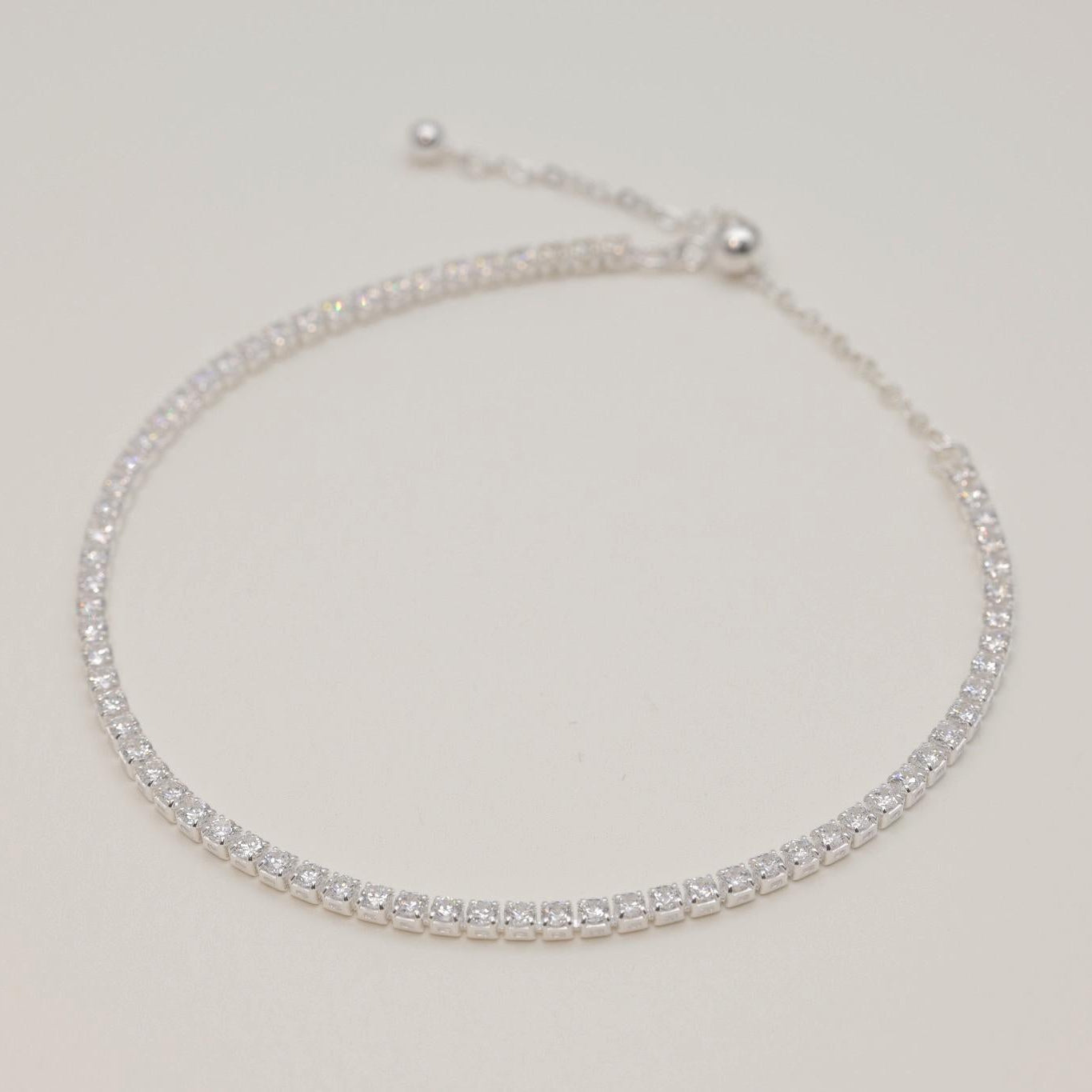 Sterling silver tennis bracelet with row of sparkling cubic zirconia